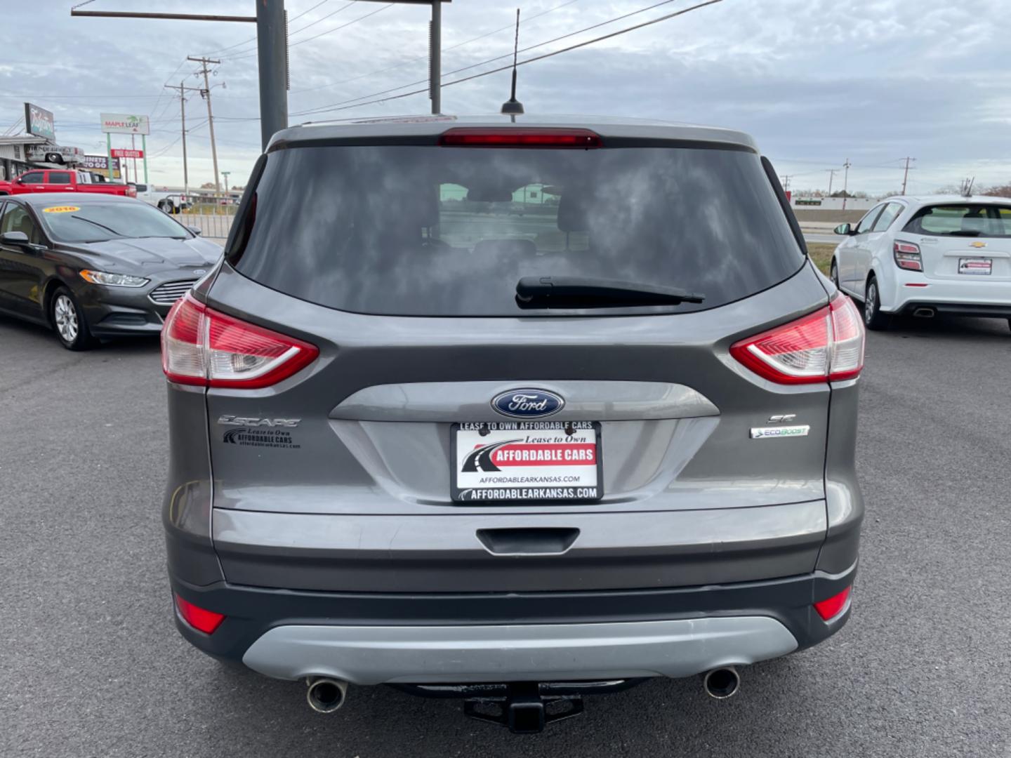 2013 Gray Ford Escape (1FMCU0GX1DU) with an 4-Cyl, EcoBoost, 1.6L engine, Auto, 6-Spd w/SelShft transmission, located at 8008 Warden Rd, Sherwood, AR, 72120, (501) 801-6100, 34.830078, -92.186684 - Photo#6